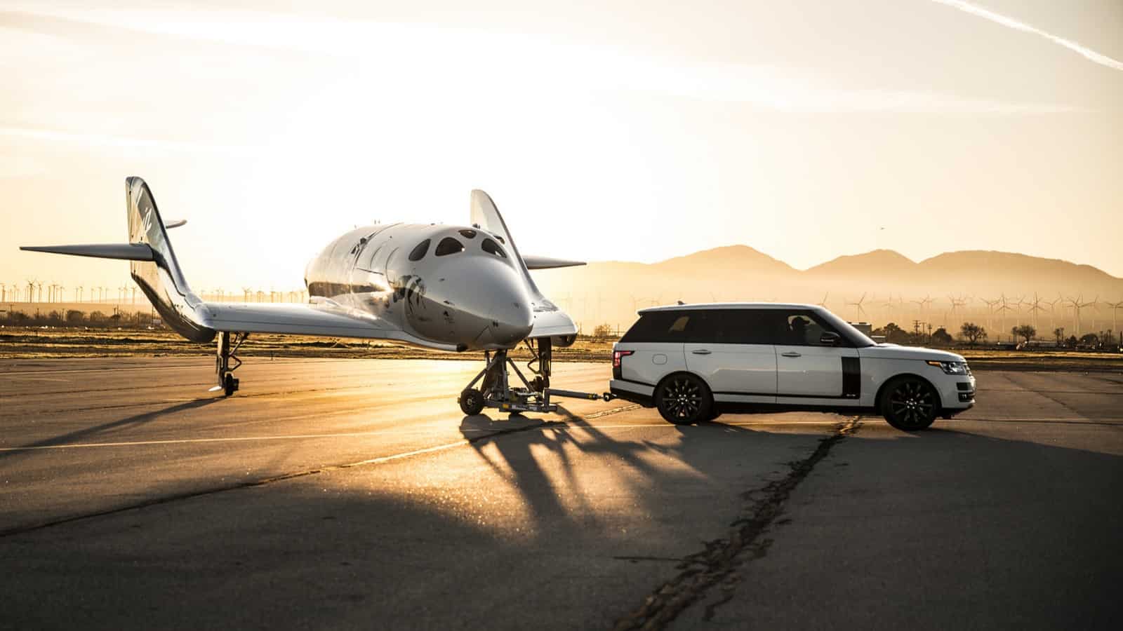 Virgina Galactic with Range Rover next to it