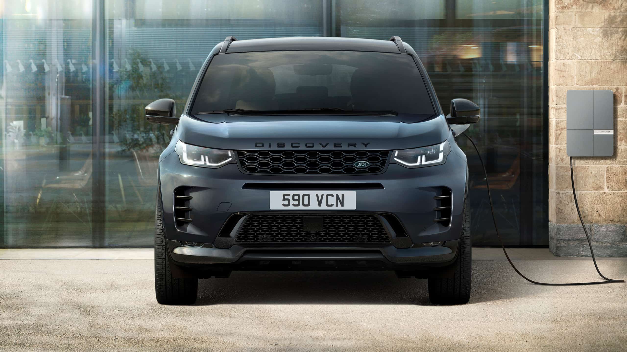 Discovery parked on EV charging station