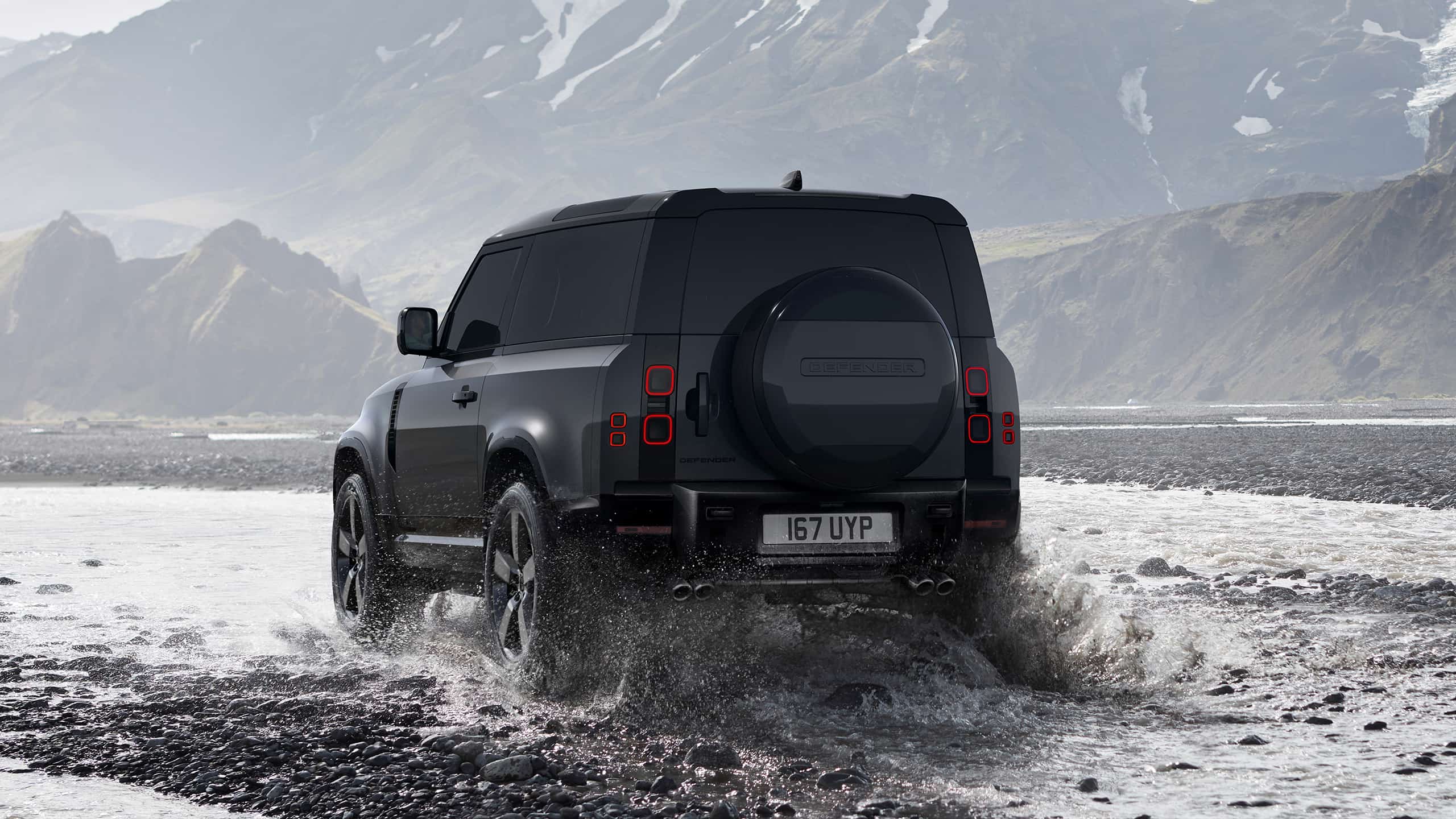 Back Side view of Defender kon mud road