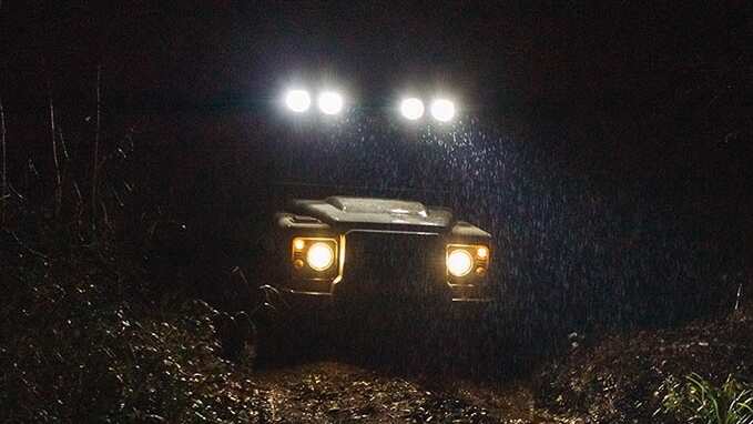 Land Rover Defender Works V8 Trophy headlamps at night 